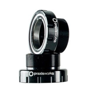 Black aluminum bottom bracket with a smooth finish, featuring threaded sections for BSA 73/68mm compatibility, and branded with "praxisworks" logo.