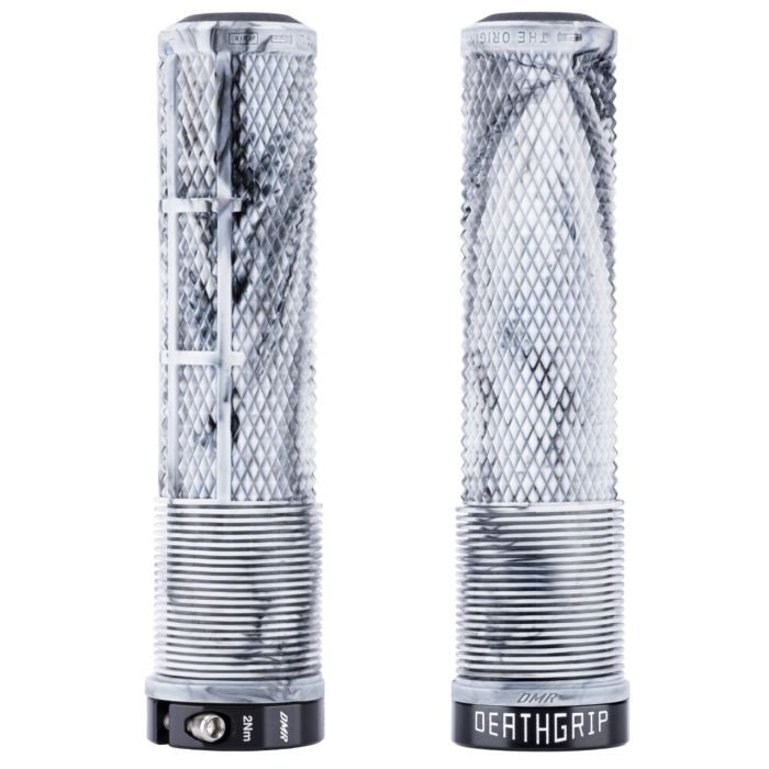 Thin white flangeless bicycle grips with a textured surface for enhanced grip, featuring a diamond pattern and a black DMR logo at the base.