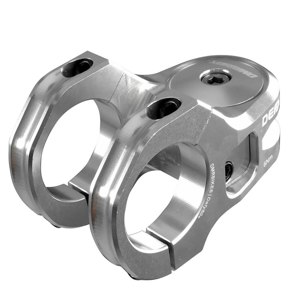 Polished silver DMR Defy stem with a 31.8mm clamp diameter and 50mm length, featuring two bolt clamp design and engraved branding.