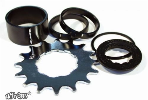 Black and silver DMR Single Speed Spacer Kit featuring a metallic sprocket with pointed edges, black spacers, and rubber O-rings, designed for single-speed bike setups.