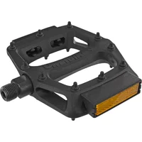 Black DMR V6 plastic pedal with reflective strip, textured surface, and multiple grip pins.