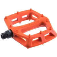 Orange DMR V6 plastic pedal with textured surface, nine grip pins, and black spindle.