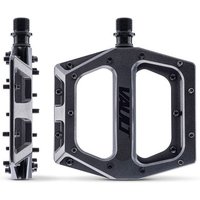 Black and silver DMR Vault Pedals with wide platform, multiple pins, and durable construction for mountain biking.