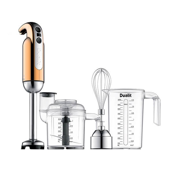 Copper hand blender with stainless steel accents, accompanied by a transparent chopping bowl, whisk attachment, and measuring jug, all branded with the Dualit logo.