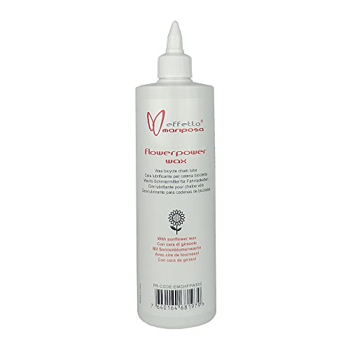 White 500ml bottle of Effetto Chain Lube Drip Flower Power, featuring a pointed nozzle and colorful branding, designed for natural wax lubrication.