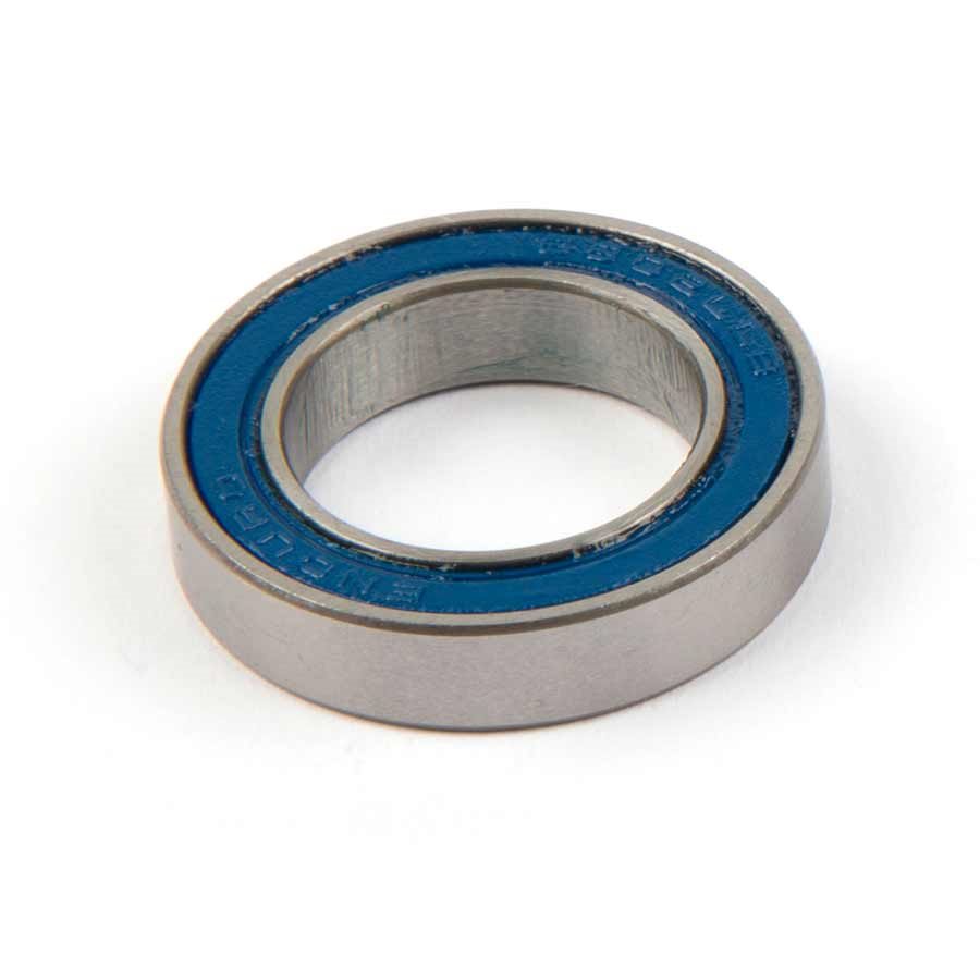 Silver metal cartridge bearing with a blue rubber seal, featuring a smooth inner surface and engraved branding on the outer edge.