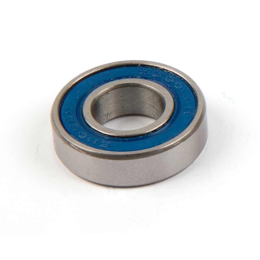 Silver metal cartridge bearing with a blue rubber seal, featuring "Enduro" embossed on the outer edge, designed for durability and performance in cycling applications.