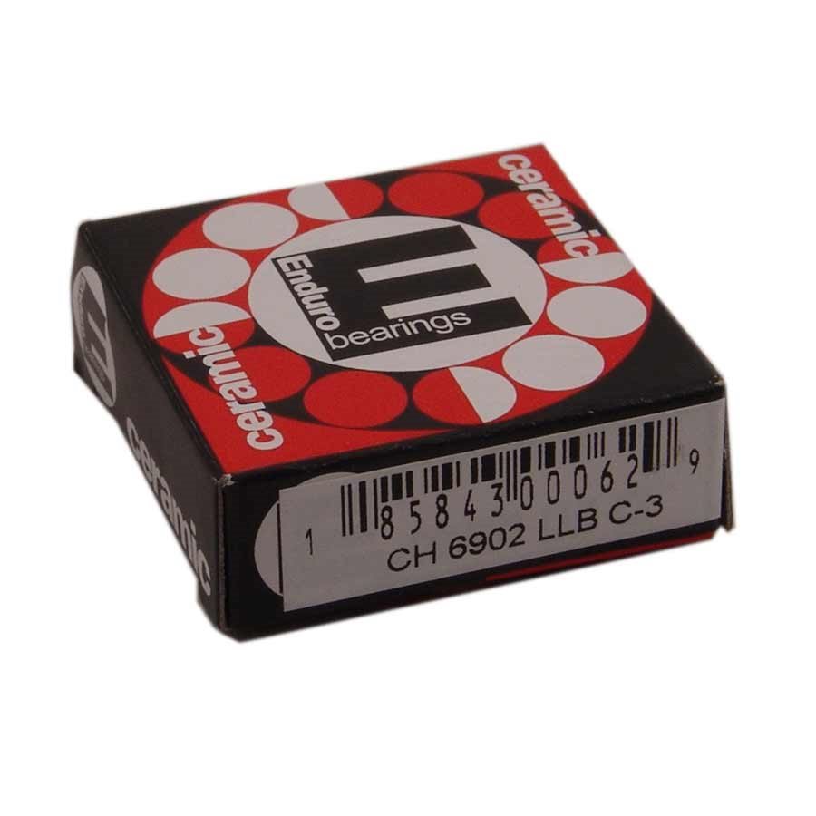 Enduro Ceramic Bearings packaging in a black box with red and white circular designs, labeled "6902 LLB" and featuring a barcode on the side.