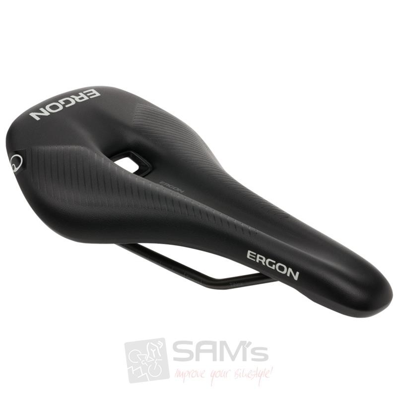 Black Ergon SR Road Comp men's saddle with a sleek design, featuring textured sides and a central cutout for comfort, mounted on a sturdy metal rail.