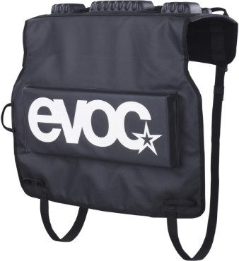 Black EVOC Tailgate Pad Duo featuring a large white logo, padded sections for bike protection, and adjustable straps for secure attachment.