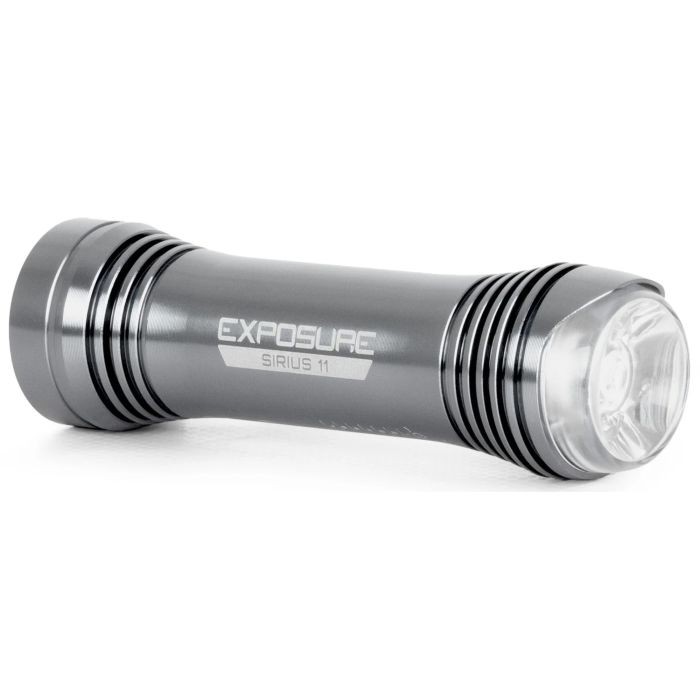 Sleek silver aluminum front light with a cylindrical shape, featuring a clear lens and the engraved text "EXPOSURE SIRIUS 11" on the side.