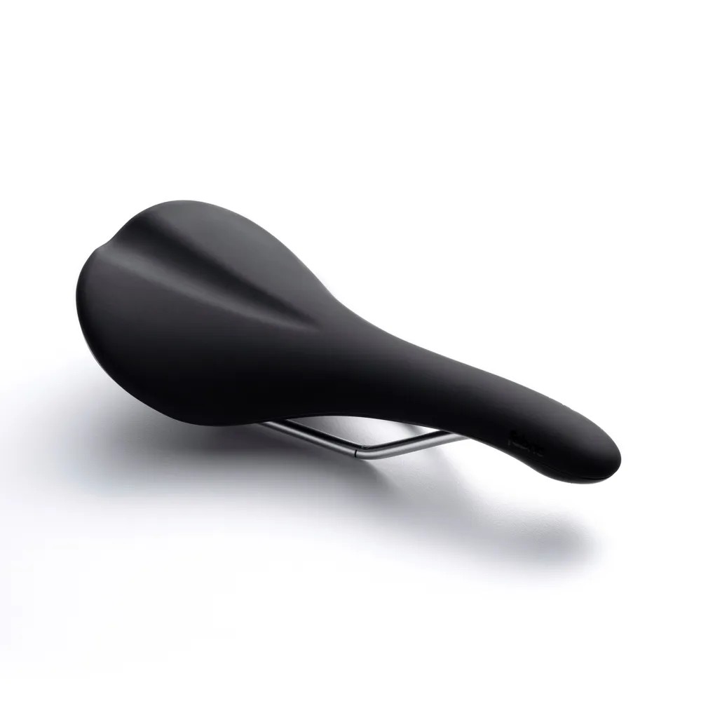 Black Fabric Scoop Elite Saddle featuring a sleek, ergonomic design with a smooth surface and a sturdy metal rail for secure attachment.