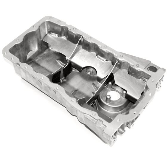 A silver, aluminum baffled sump with intricate internal features, including a rounded oil pump area and multiple compartments for optimal oil management.
