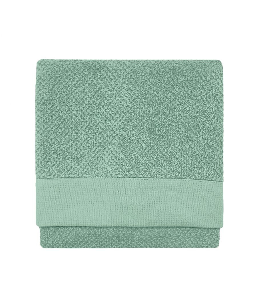 Textured grey cotton hand towel featuring a woven design, neatly folded with a smooth border, ideal for bathroom or kitchen use.
