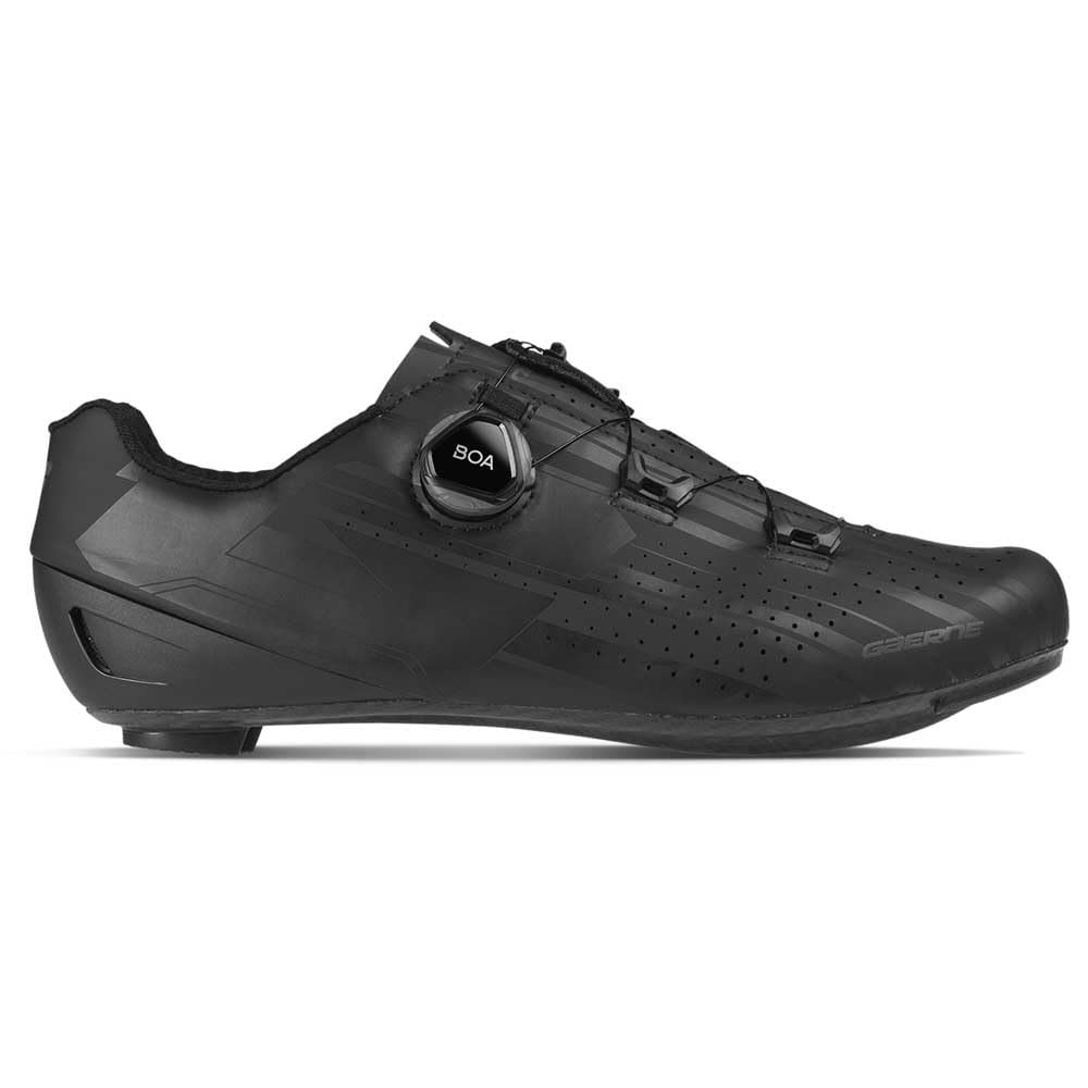 Sleek black cycling shoe with a carbon sole, featuring a Boa dial for a secure fit and perforated detailing for breathability, designed for performance and comfort.