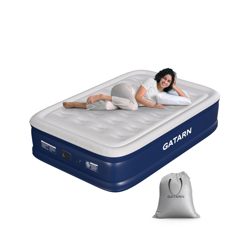 Blue double inflatable mattress with a built-in electric pump, featuring a soft, quilted top, and a woman comfortably lying on it, accompanied by a storage bag.