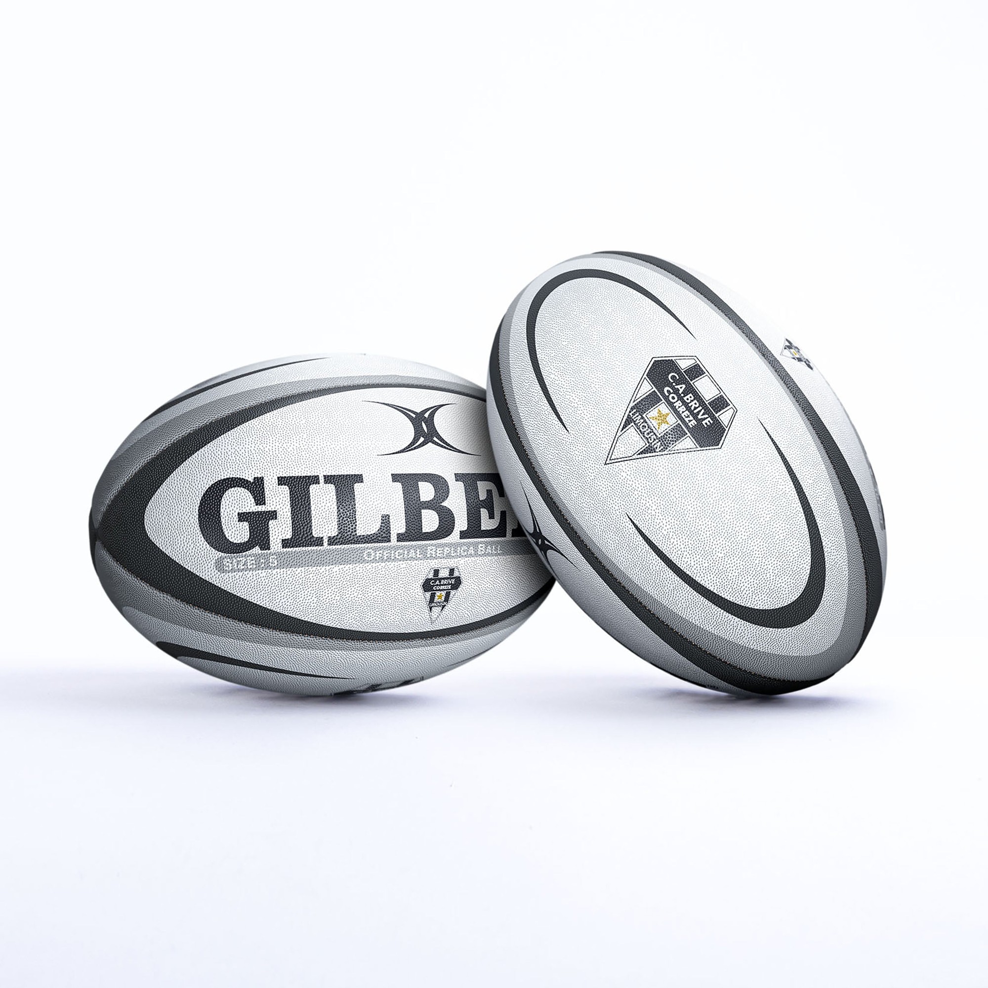 White rugby ball featuring black and grey accents, embossed texture, and "GILBERT" branding, with the CA Brive logo and size 5 designation prominently displayed.