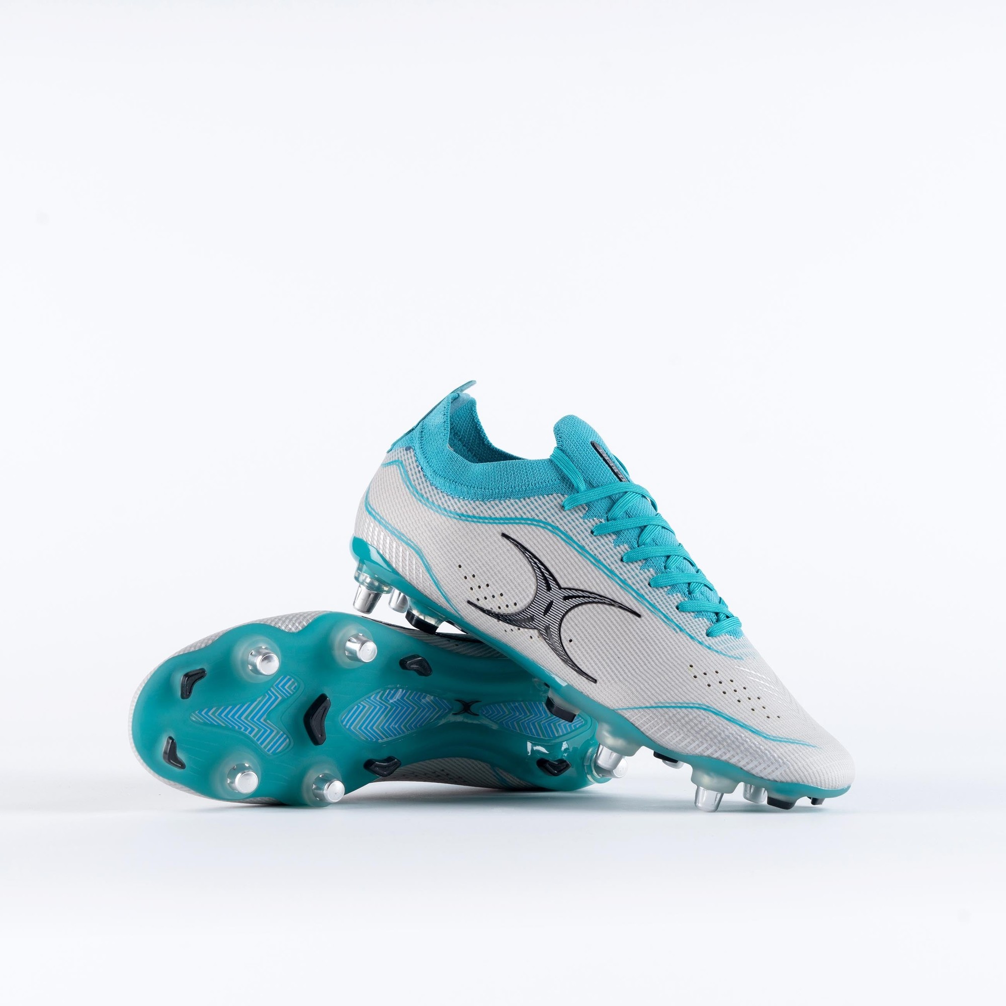 Grey and aqua Gilbert Rugby Cage Pace Pro 6S boots featuring a lightweight mesh upper, textured detailing, and six metal studs for traction on the field.