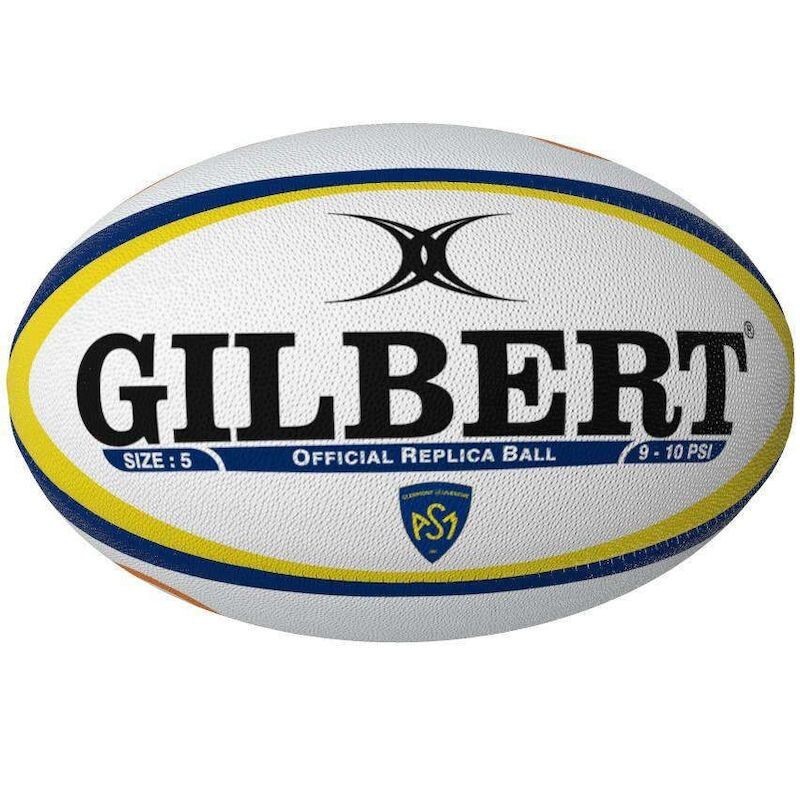 White rugby ball with blue and yellow accents, featuring "GILBERT" in bold black letters, marked as "SIZE 5" and "Official Replica Ball," with a pressure range of 9-10 PSI.