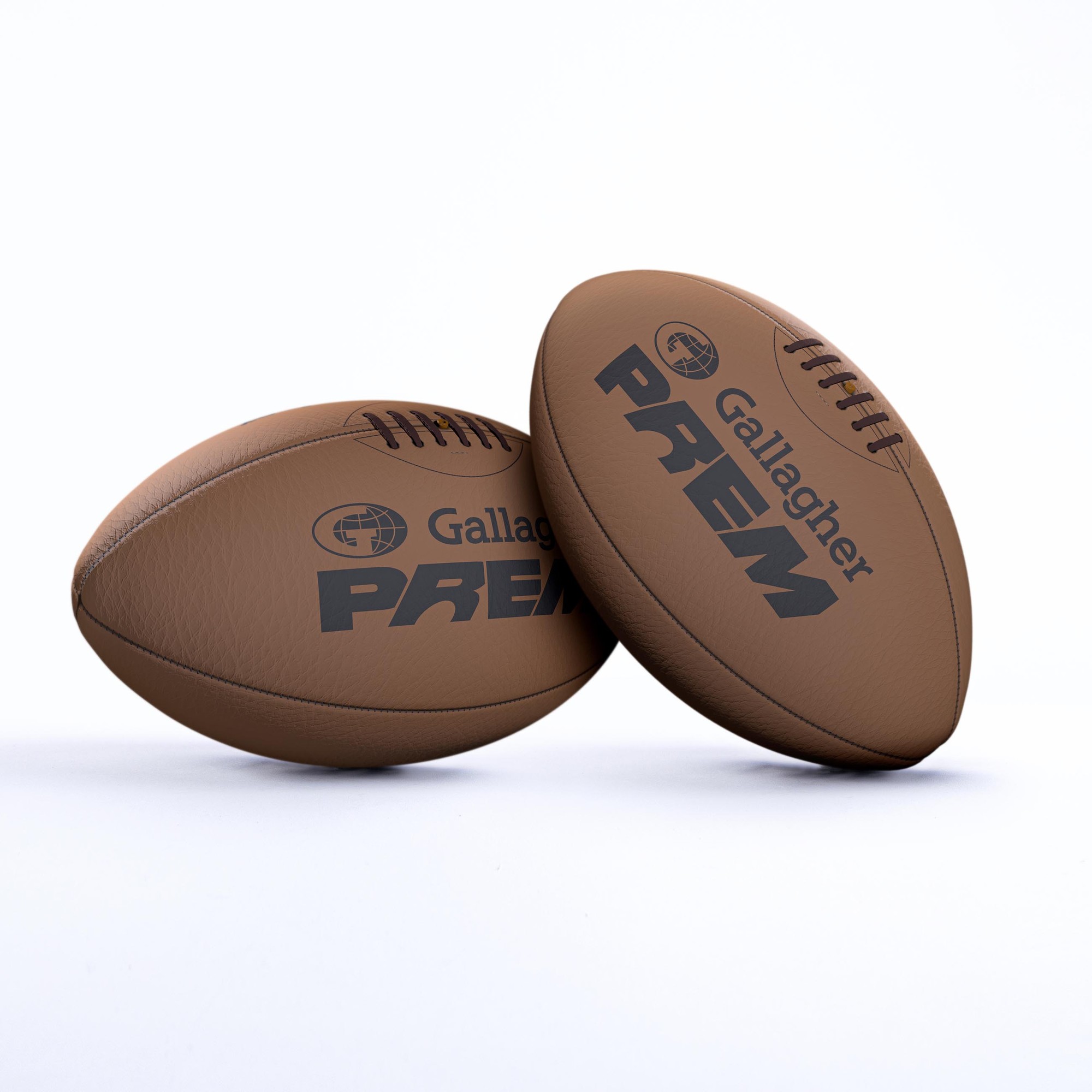 Brown leather rugby balls with "Gallagher PREM" printed in black, featuring traditional stitching and a classic design, suitable for vintage rugby enthusiasts.