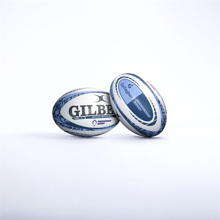 White rugby ball featuring blue accents, embossed logo, and "Gilbert Gallagher Premiership Rugby" branding, designed for replica use.