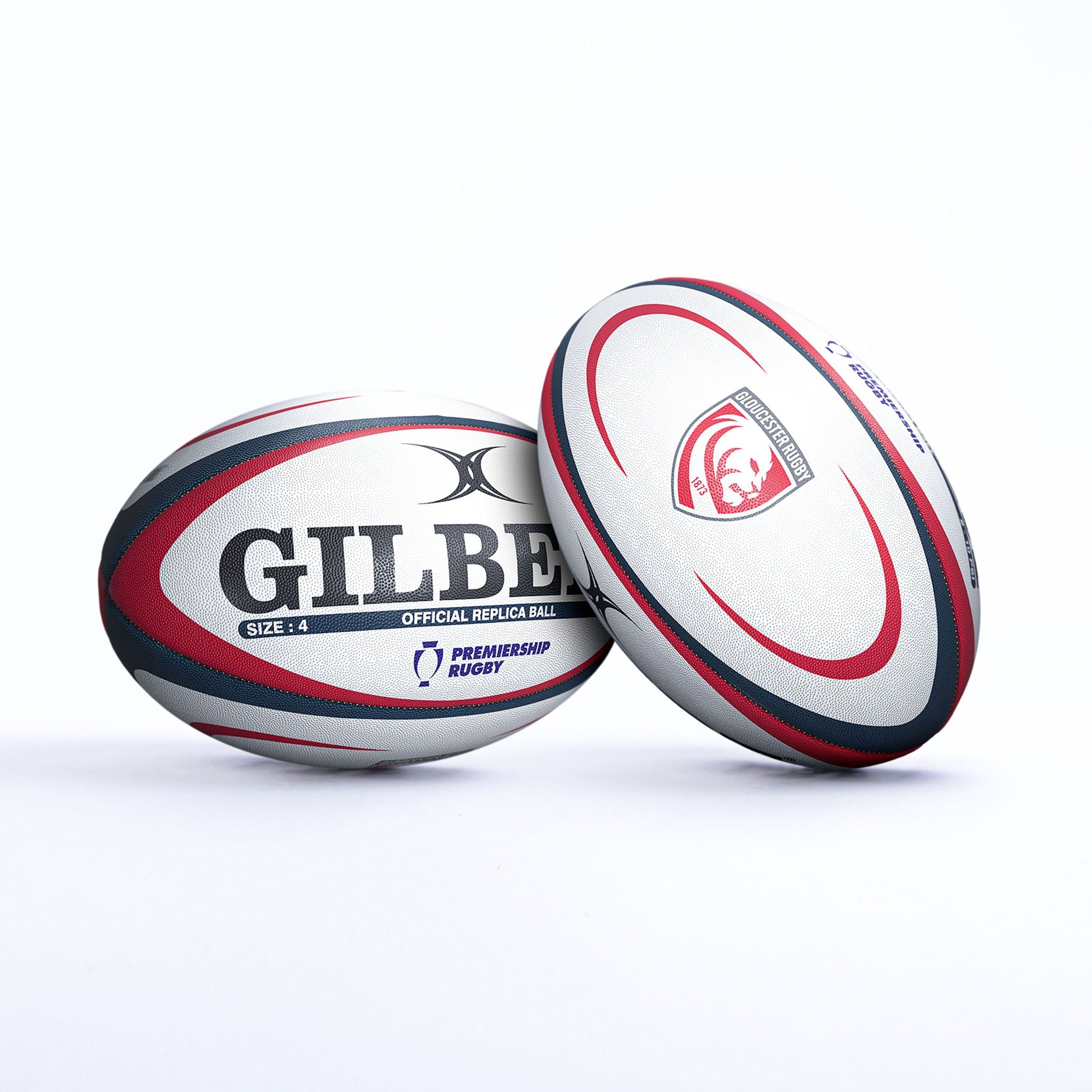 White rugby ball with red and blue accents, featuring the Gilbert logo, "Size 4" label, and Gloucester Rugby emblem, designed for official replica use.