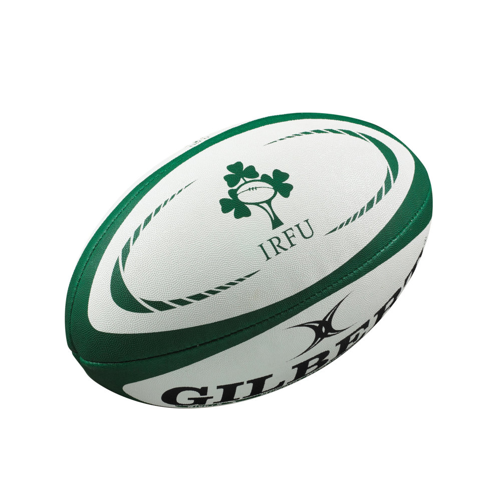 Green and white Gilbert Ireland replica rugby ball featuring a shamrock design, "IRFU" logo, and textured surface for grip.