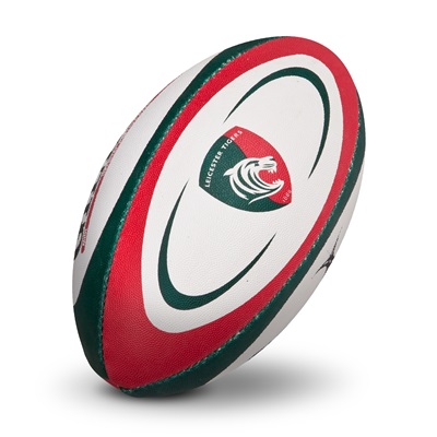 A white rugby ball featuring red and green stripes, with the Leicester Tigers logo prominently displayed on one side.