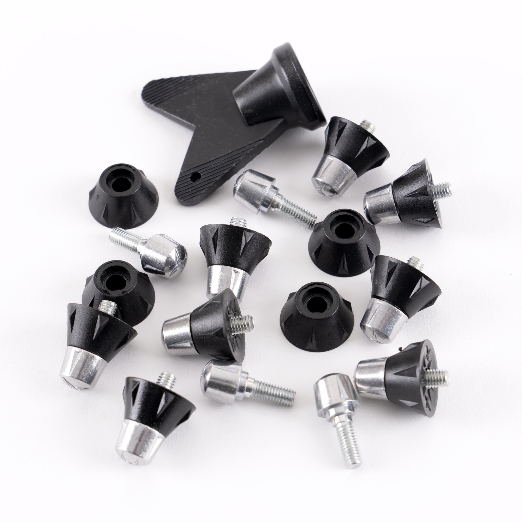 Silver and black Gilbert Pro Tip Studs for rugby, featuring various stud shapes and sizes, with a durable plastic base and metal screw fittings, arranged on a white background.