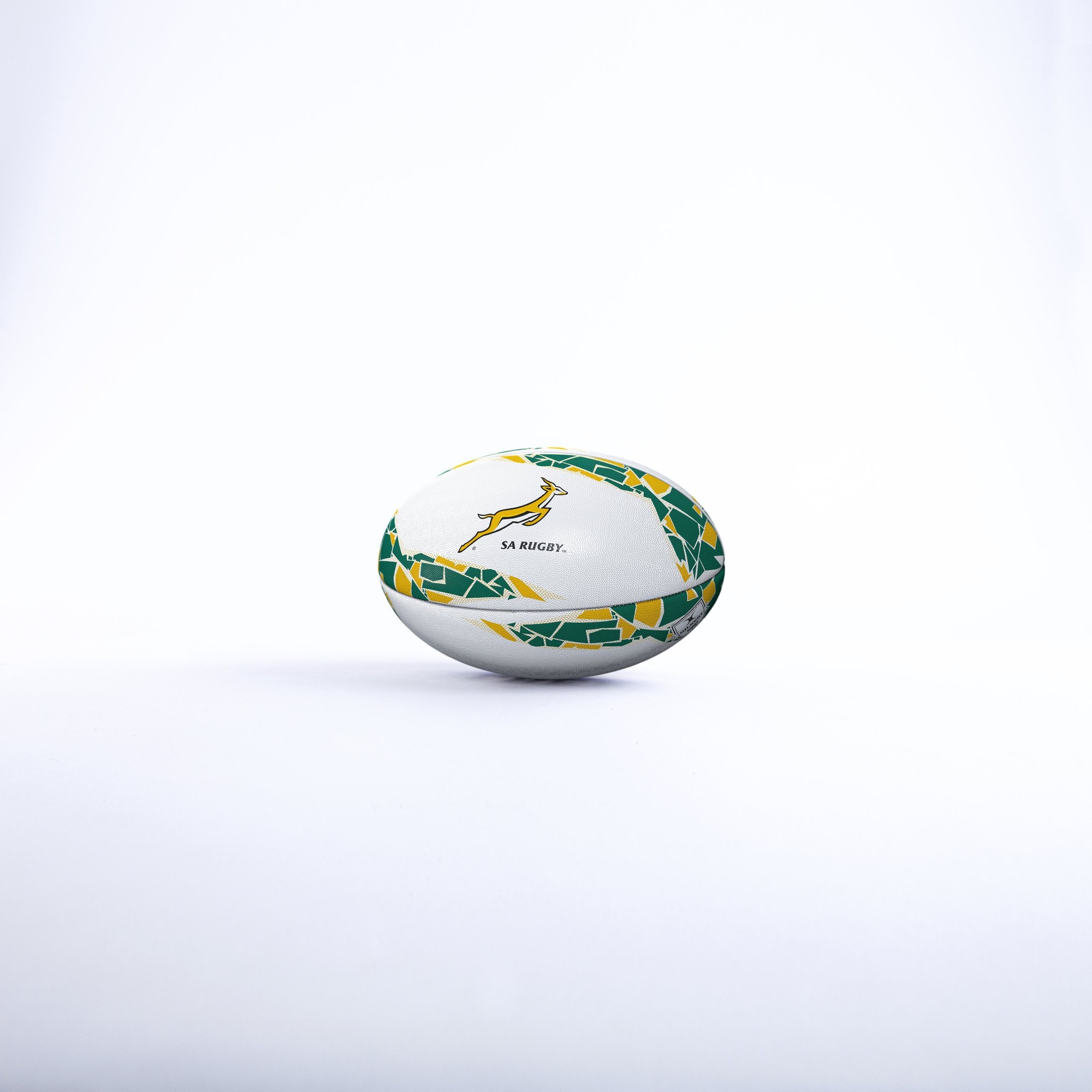 White rugby ball featuring a yellow Springbok logo, surrounded by green and yellow geometric patterns, designed for South Africa supporters.