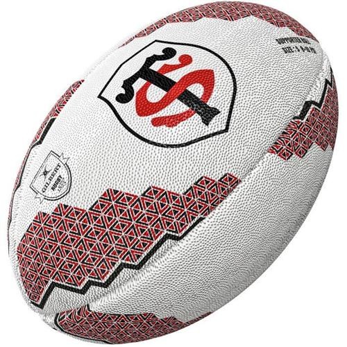 White rugby ball with red and black accents, featuring the Stade Toulousain logo and a textured surface for grip, designed for supporters of the team.