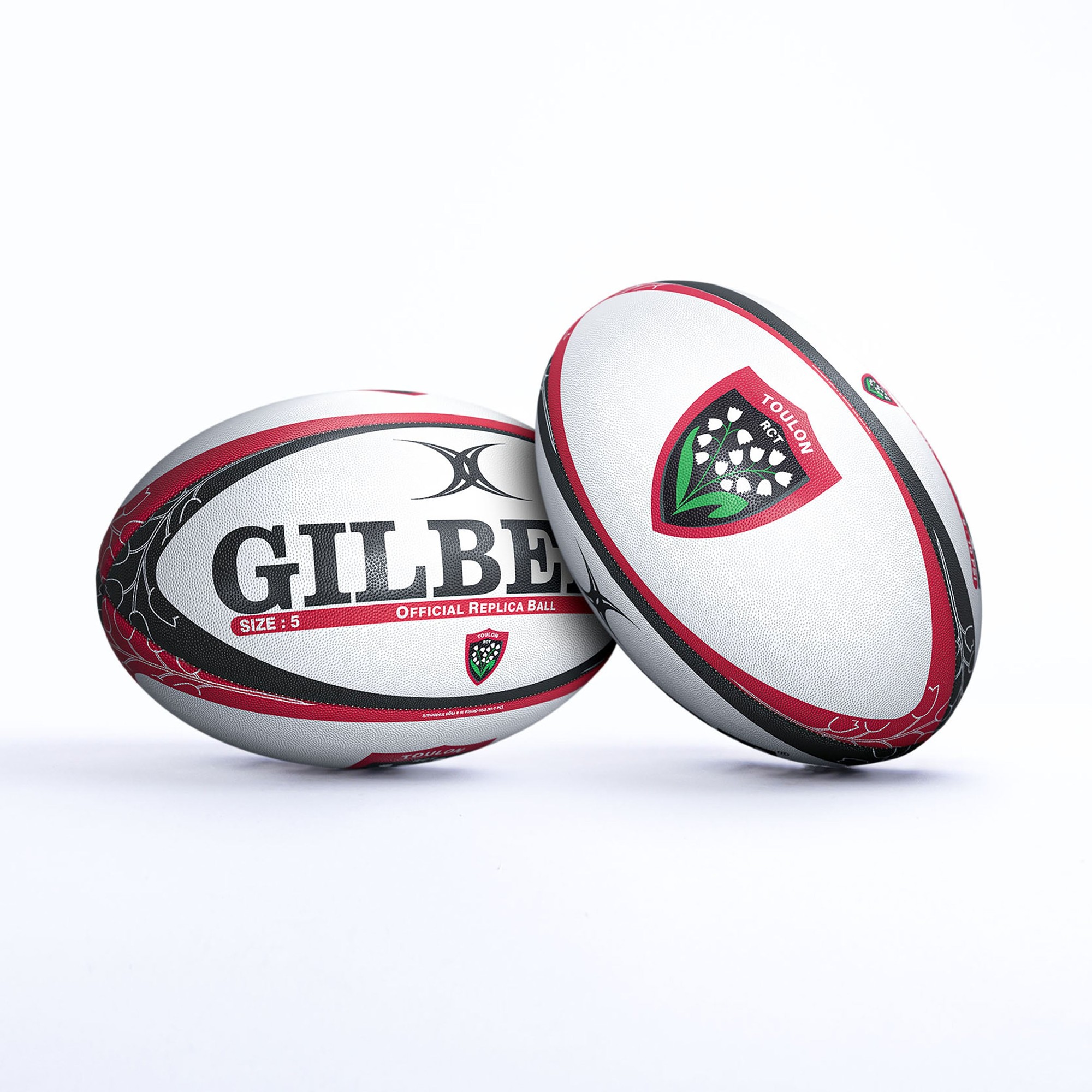 White rugby ball with red and black accents, featuring "GILBERT" branding, Toulon logo, and size 5 designation, made from durable synthetic material.