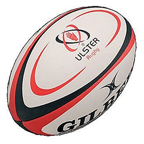 White rugby ball with red and black accents, featuring the "Gilbert" logo and "Ulster Rugby" text, designed for replica play with a textured surface for grip.