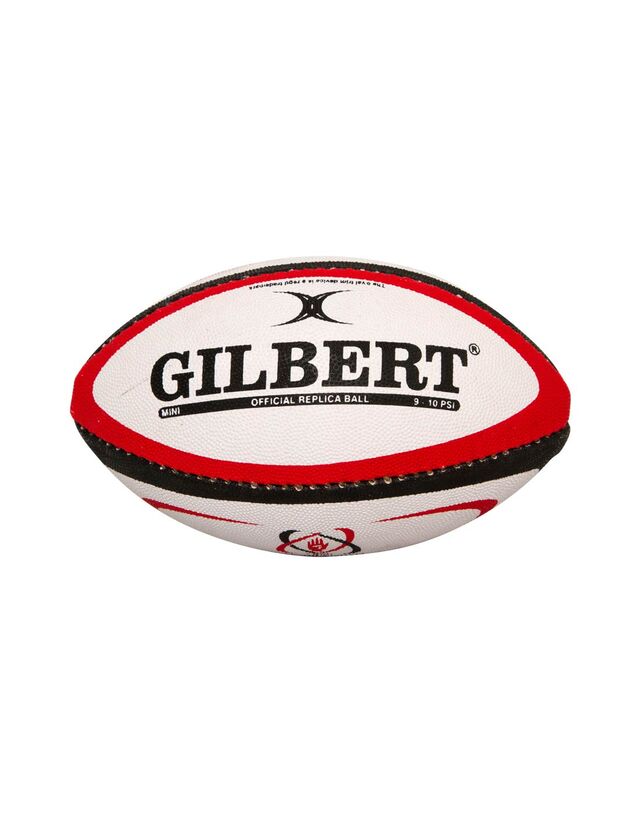 White rugby ball with red and black accents, featuring the Gilbert logo, "Official Replica Ball" text, and Ulster Rugby emblem.
