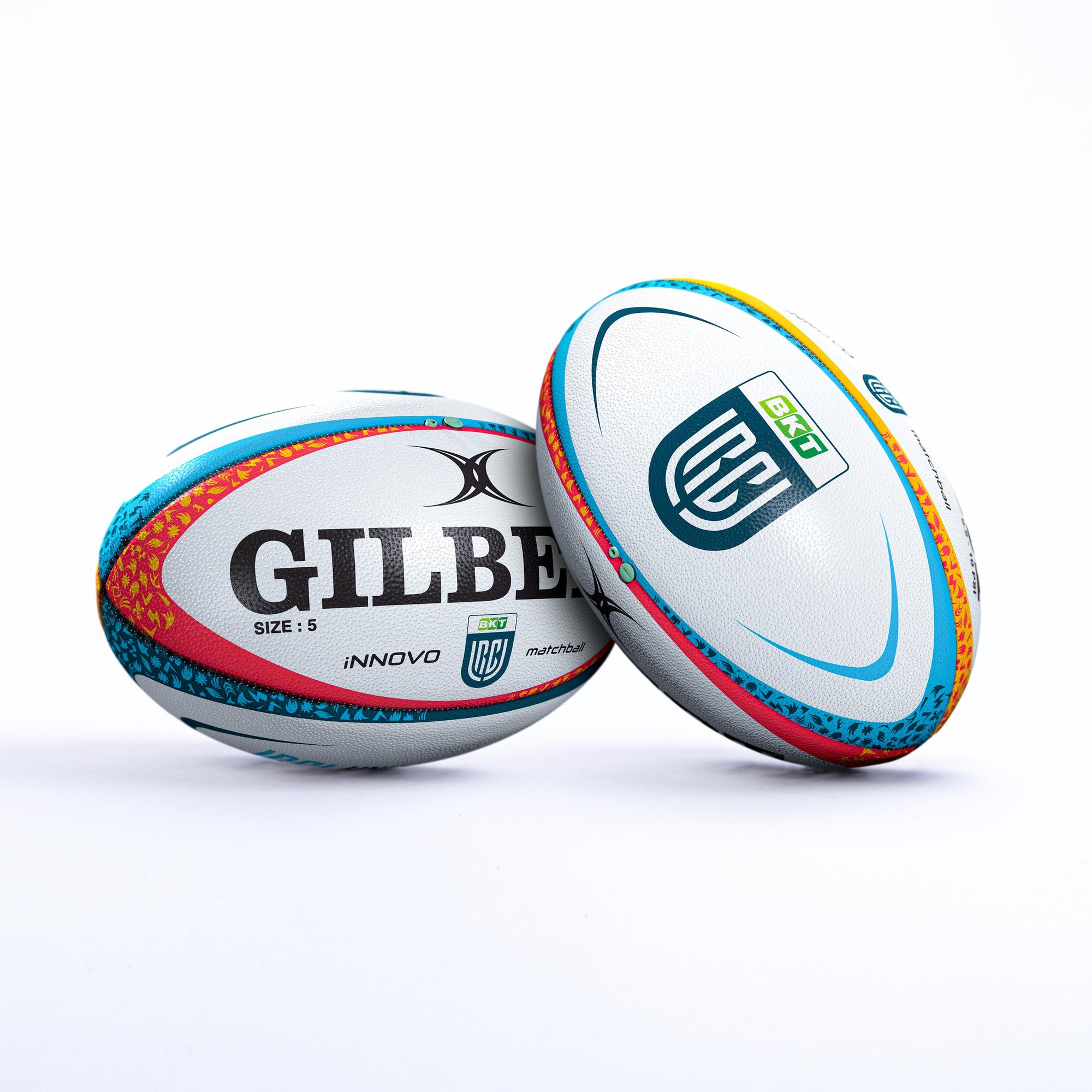 White rugby ball with blue and orange accents, featuring "GILBERT" branding, "SIZE 5," and URC logo, made of durable synthetic material for match play.
