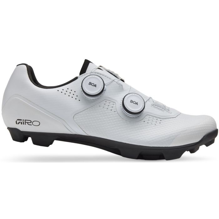 White Giro Regime XC shoes in size 42 feature a sleek design, textured upper material, and dual BOA dial closures for a secure fit, with a rugged black outsole for traction.