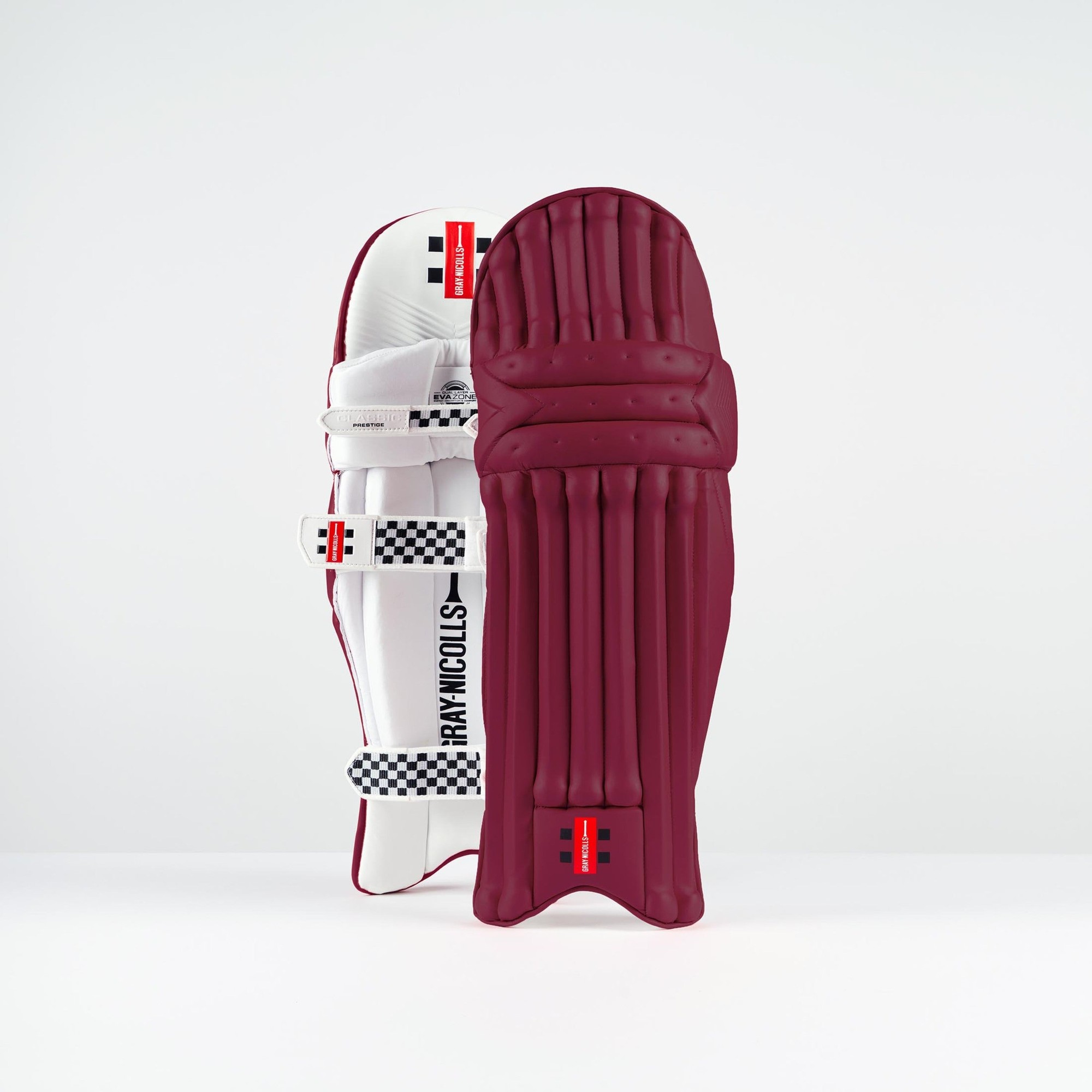 Gray-Nicolls Classic Prestige Batting Pads in multicolour, featuring a white front with maroon accents, padded protection, and adjustable straps for secure fit.