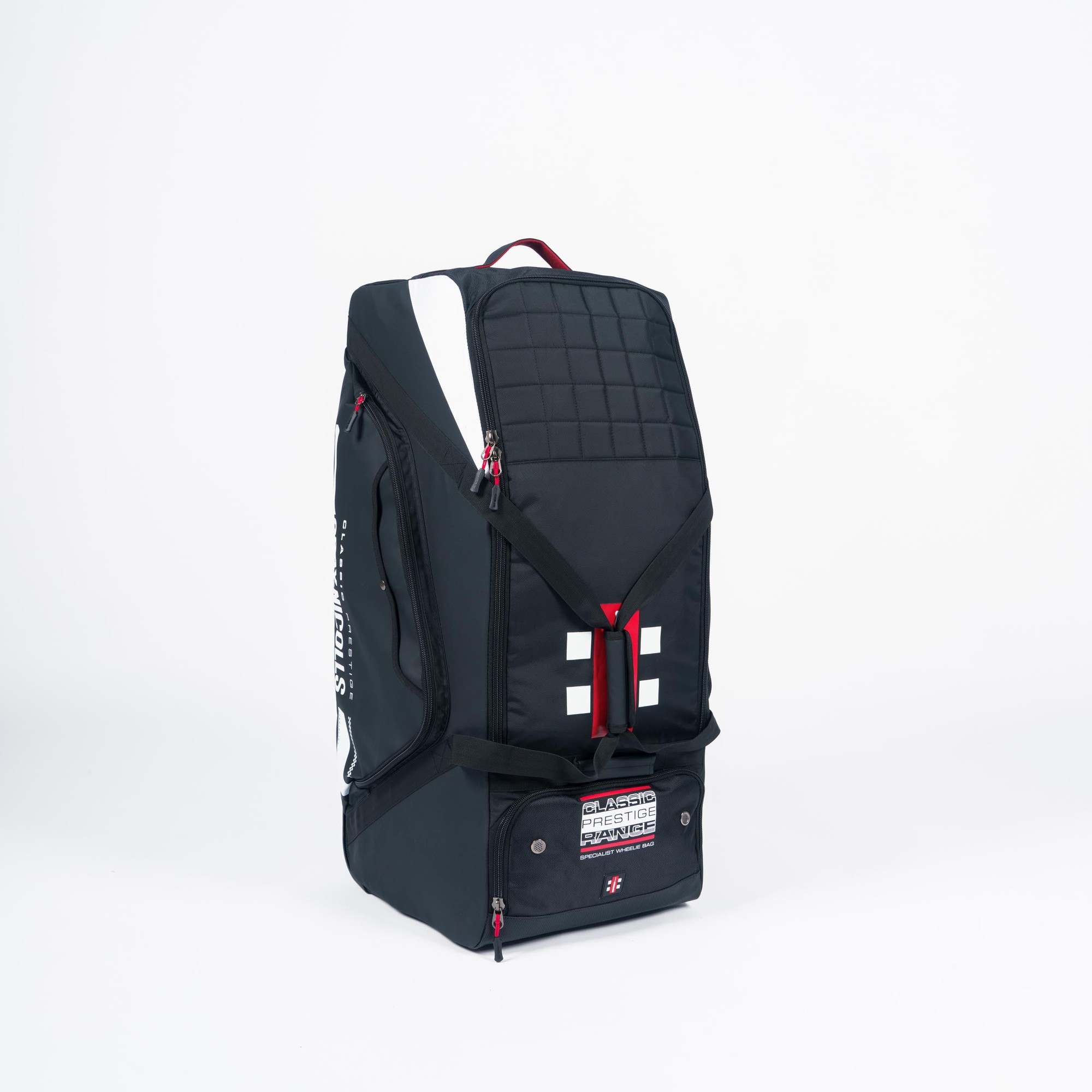 Gray-Nicolls Classic Prestige Wheelie Bag in black features a sleek design, padded top, red accents, multiple compartments, and durable wheels for easy transport.