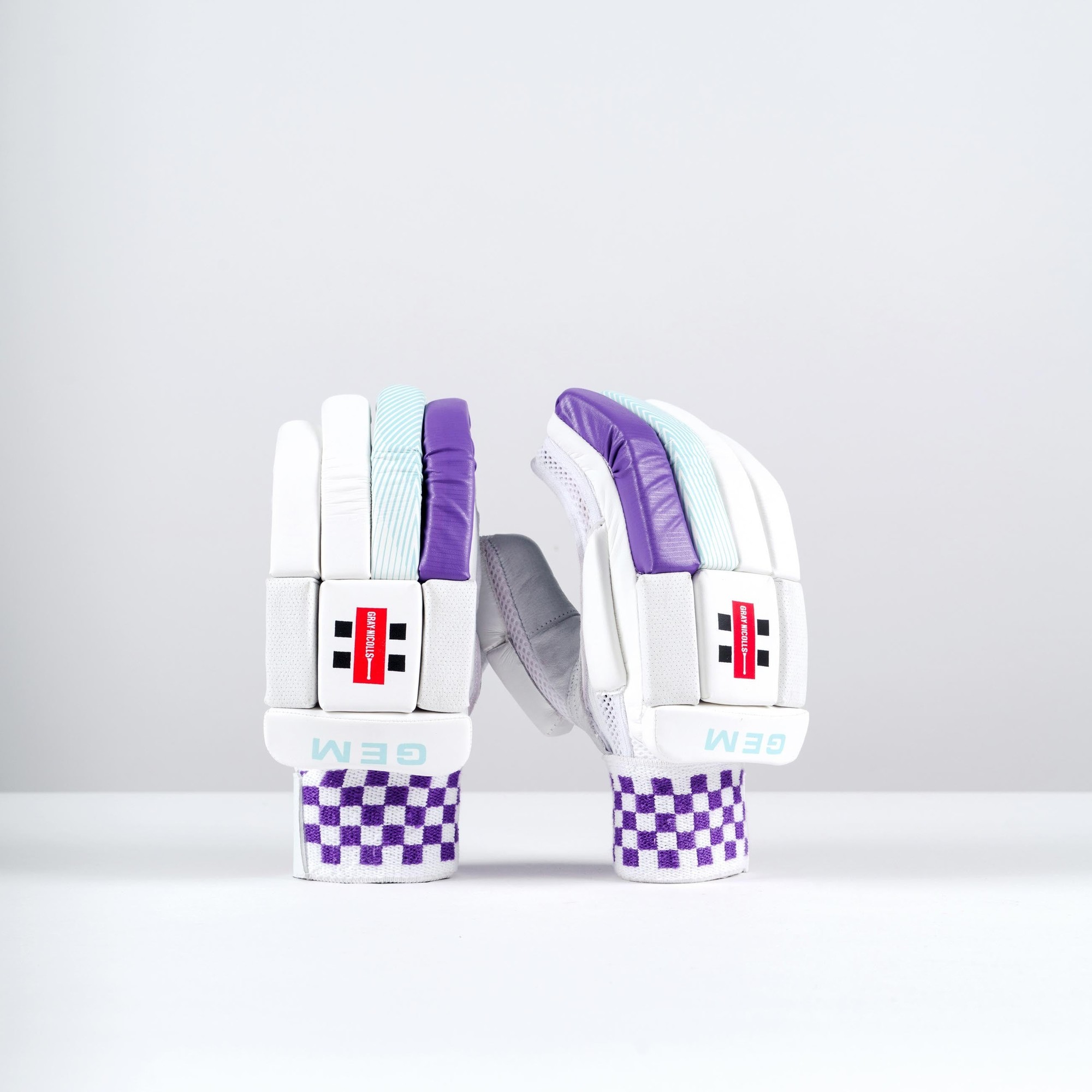 Gray-Nicolls GEM 2.1 250 batting gloves in white, featuring purple accents, textured grip, and a checkered wristband for enhanced support and comfort.