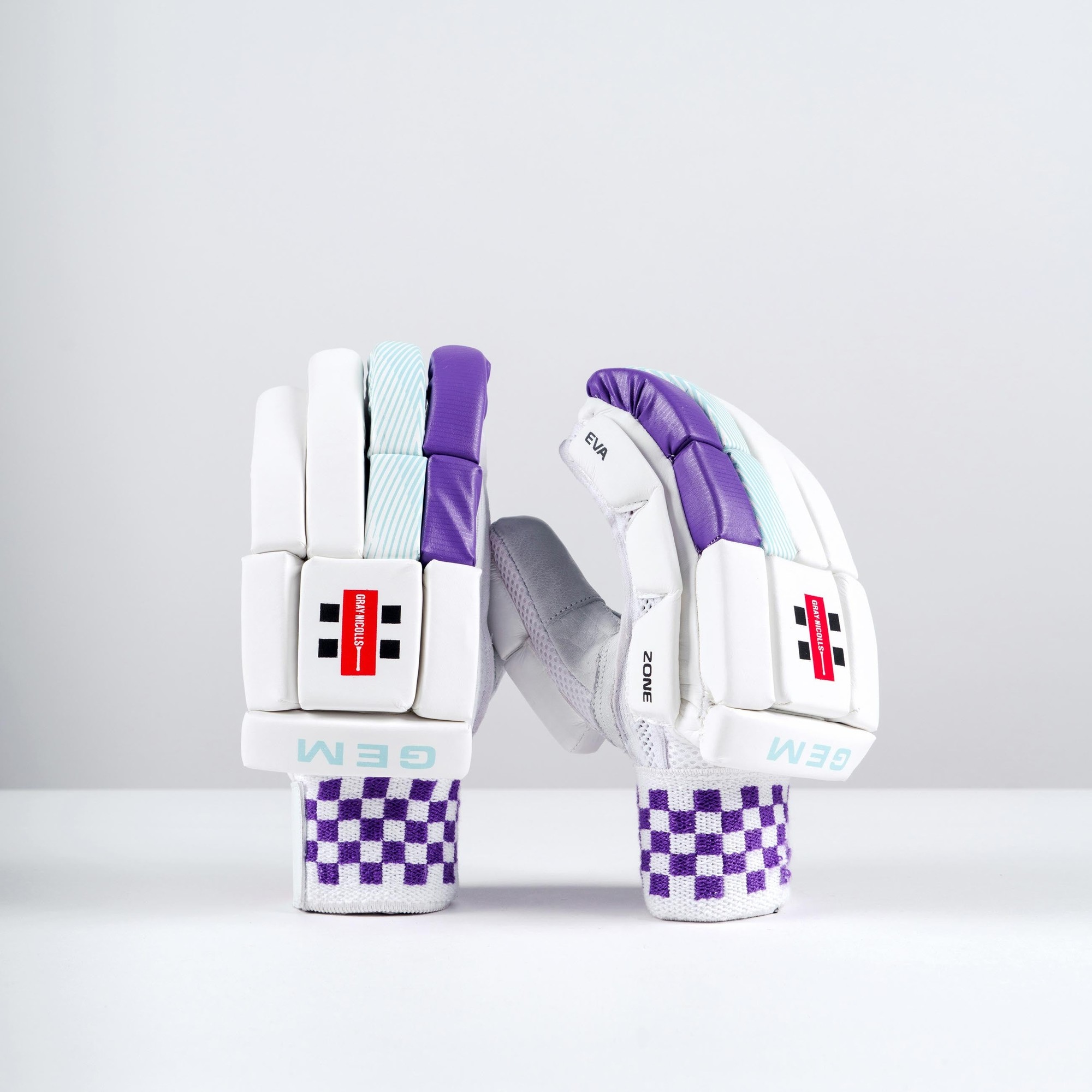 White batting gloves with purple and light blue accents, featuring a textured grip, reinforced padding, and a checkered pattern on the wrist area, labeled "GEM" on the cuff.