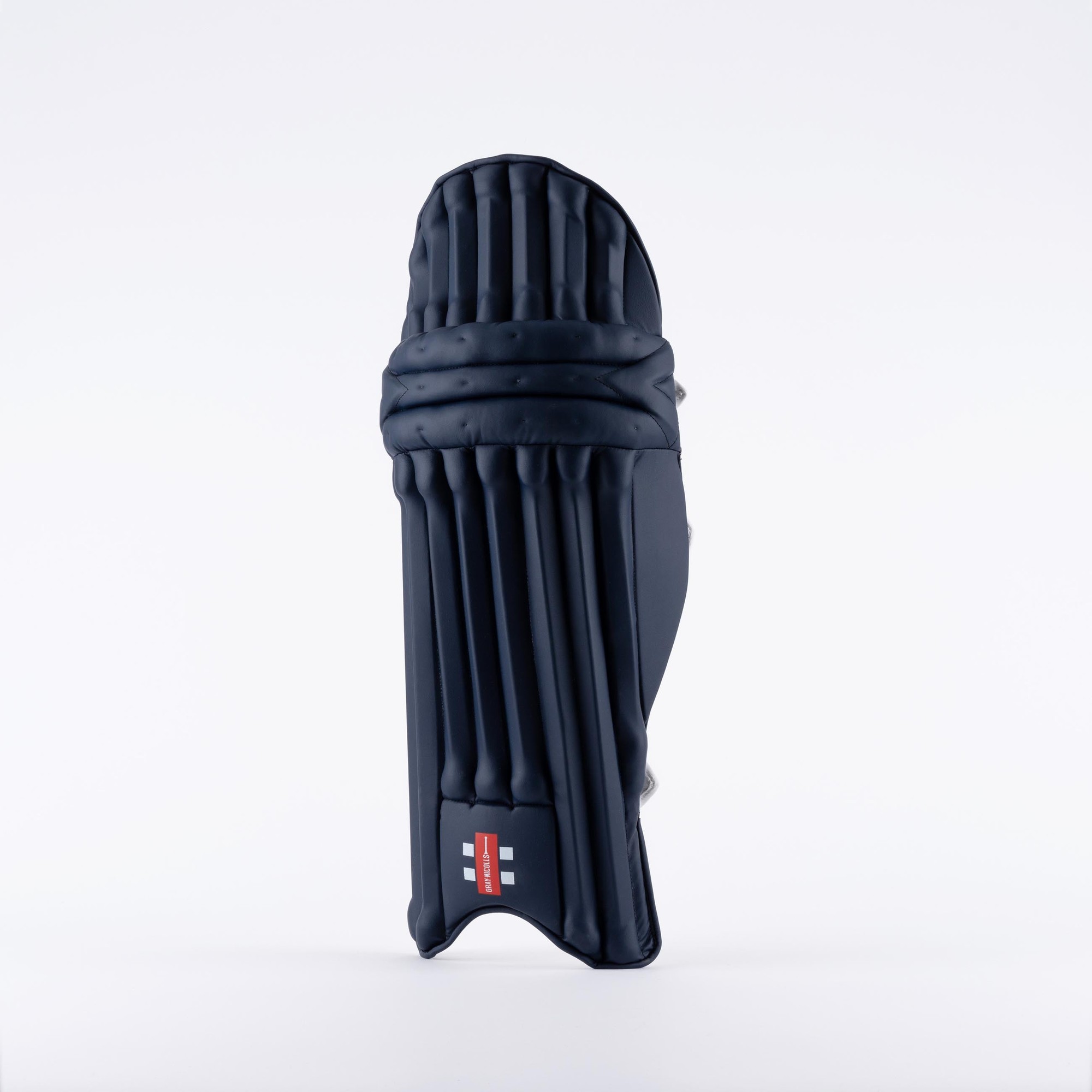 Black Gray-Nicolls Prestige batting pads featuring a sleek design, padded protection, and vertical grooves for enhanced comfort and performance.
