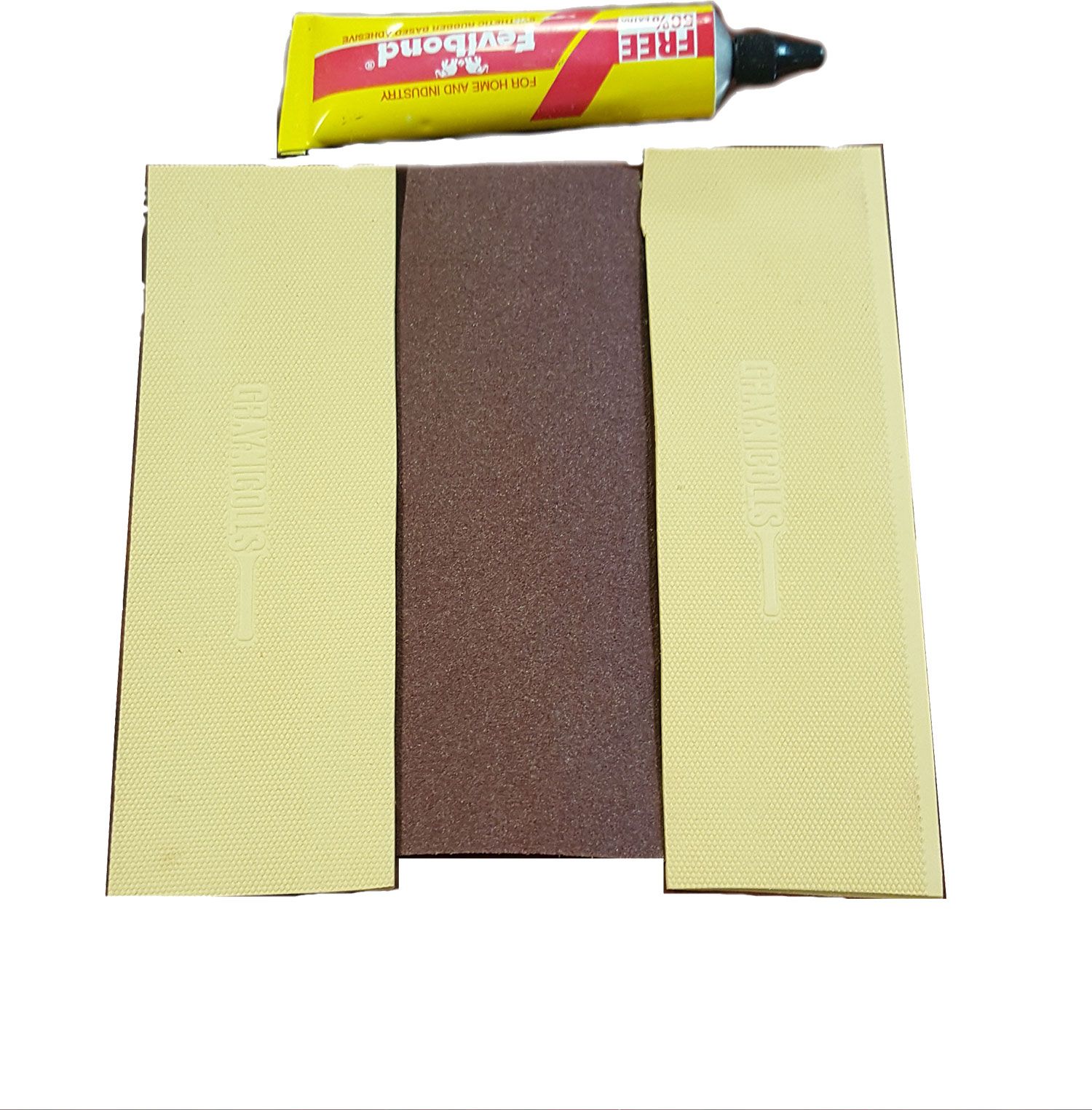 Gray-Nicolls Protectoe in clear color features a textured surface with a brown center, accompanied by a tube of adhesive, ideal for cricket bat protection.