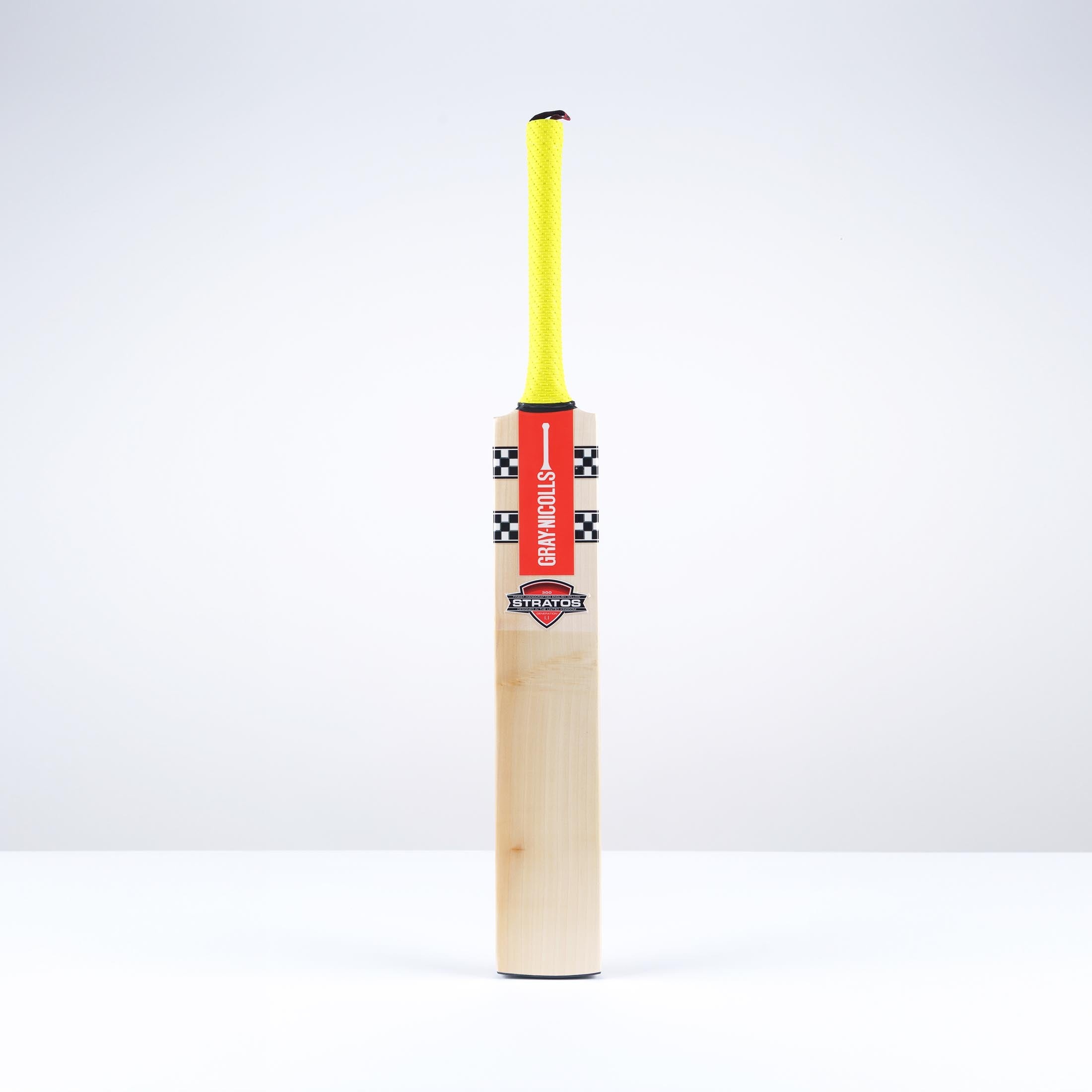 Gray-Nicolls Stratos 1.1 300 cricket bat featuring a light wooden blade, black and red branding, and a bright yellow grip on the handle.