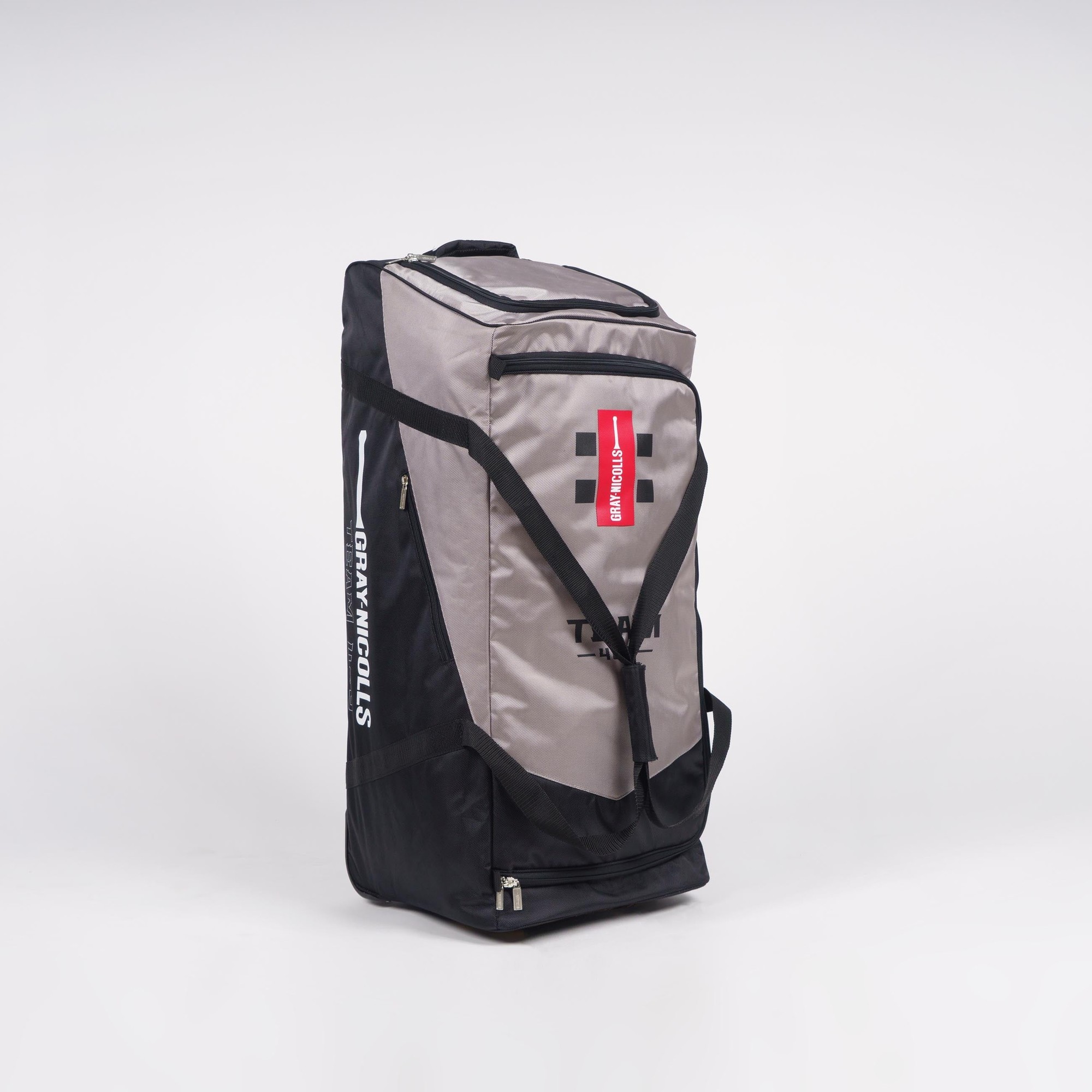 Gray-Nicolls Team 400 Wheelie Bag in black and gray, featuring durable material, a large main compartment, side pockets, and sturdy wheels for easy transport.