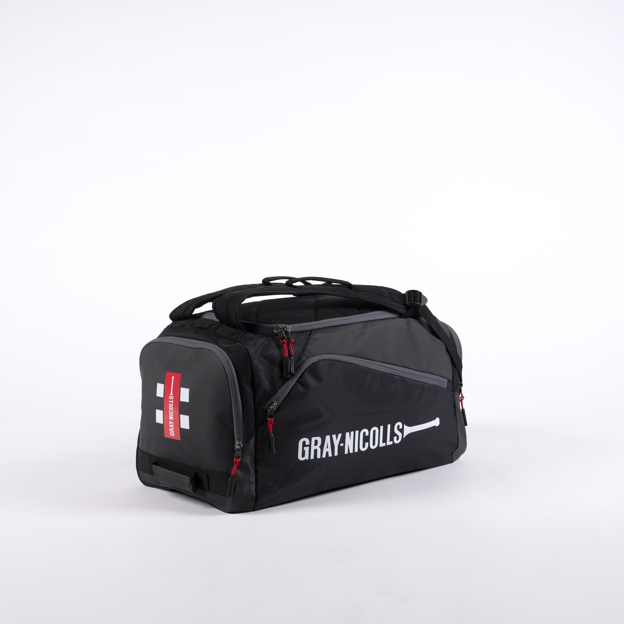 Gray-Nicolls Team Holdall in black, featuring a spacious main compartment, red zipper accents, and the brand logo prominently displayed on the side.
