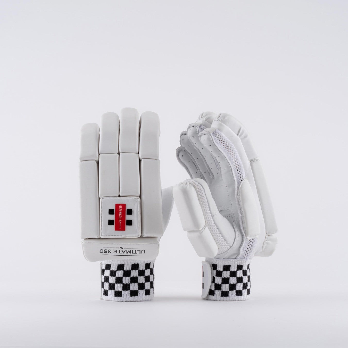 White Gray-Nicolls Ultimate 350 batting gloves featuring a padded design, breathable mesh, and a black and white checkered wrist strap.