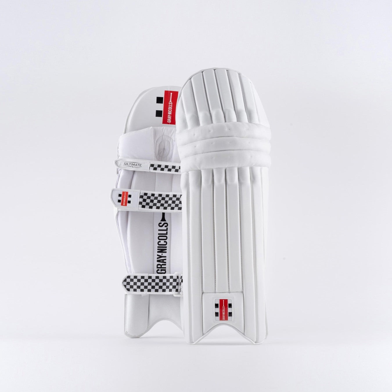 Gray-Nicolls Ultimate Batting Pads in black, featuring a sleek design, padded protection, and adjustable straps for a secure fit, ideal for cricket players.