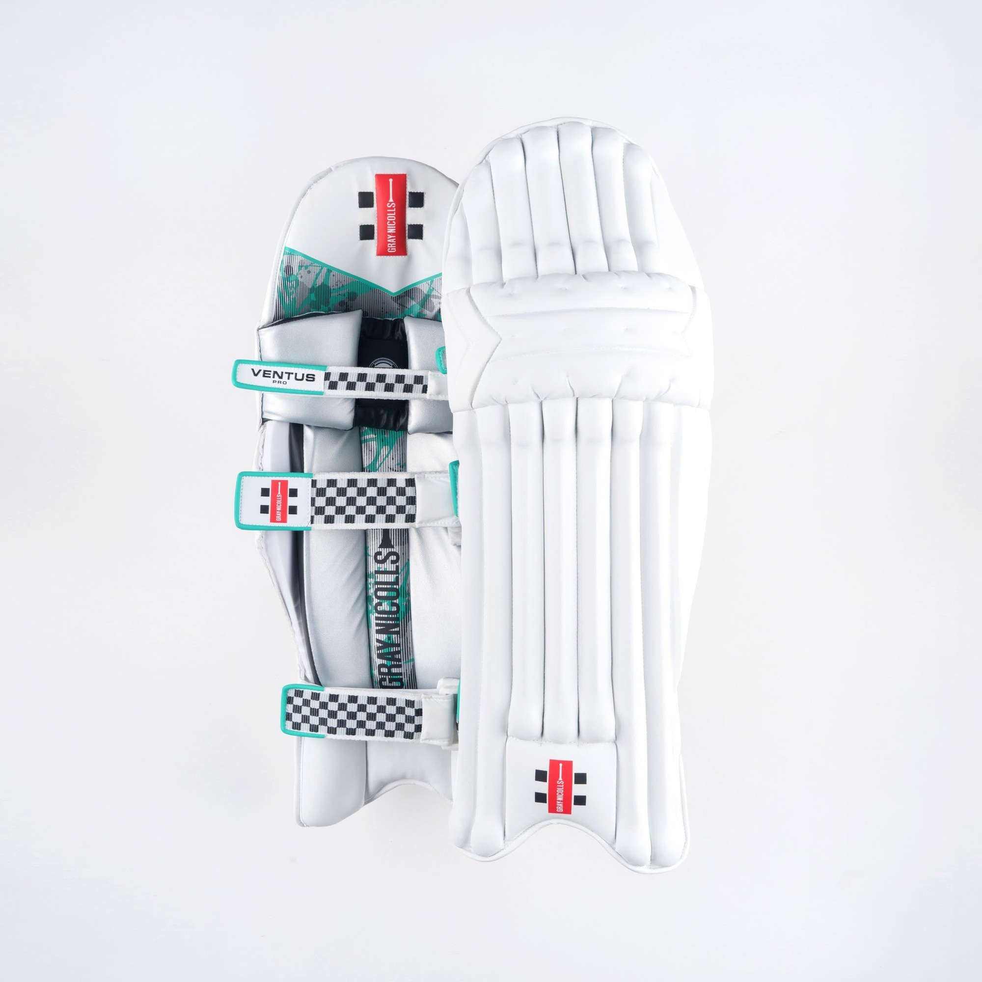 Gray-Nicolls Ventus 1.0 Pro batting pads in white, featuring a sleek design, padded protection, and turquoise accents with adjustable straps for a secure fit.