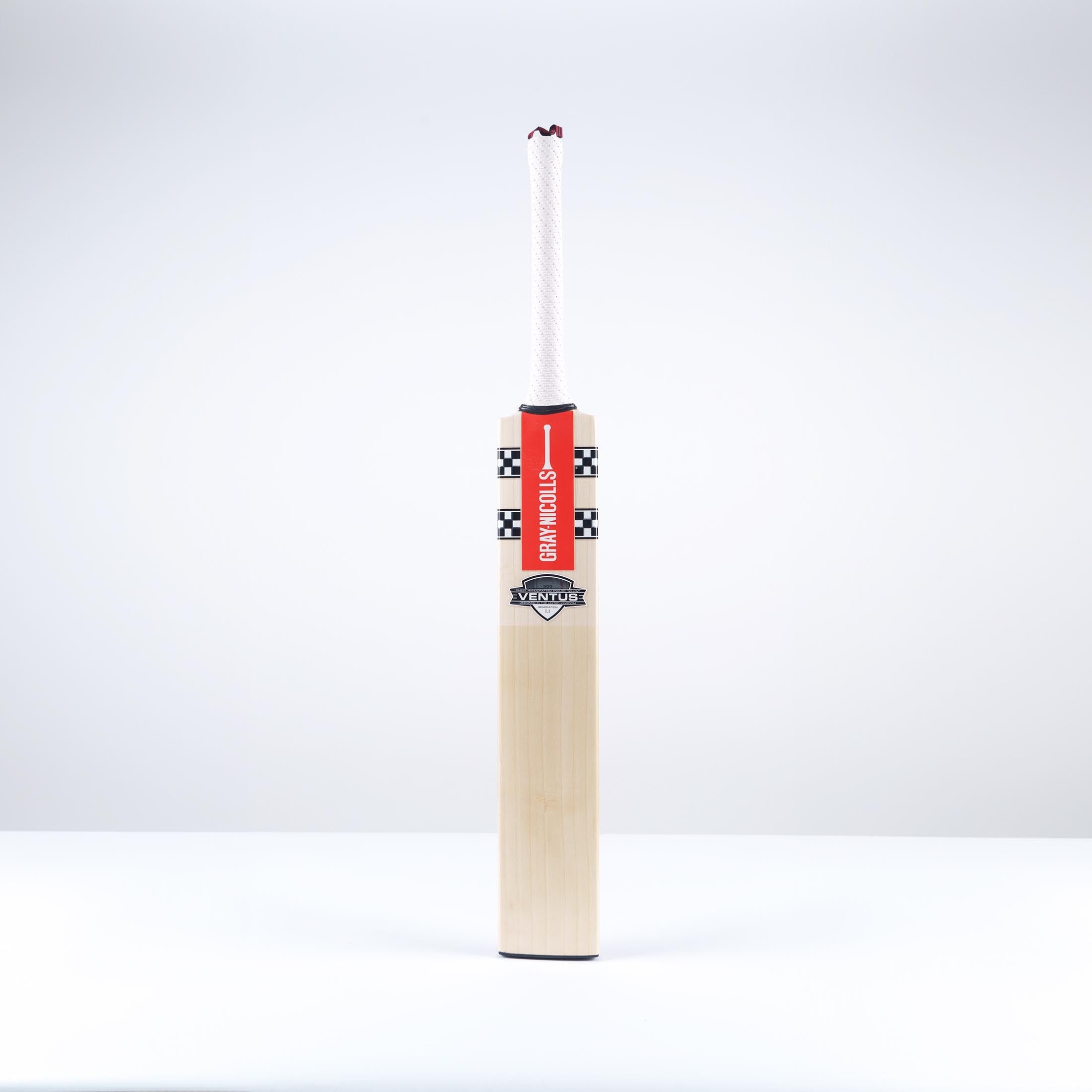Gray-Nicolls Ventus 1.1 300 cricket bat featuring a smooth wooden blade, red and black branding, and a white textured grip for enhanced handling.