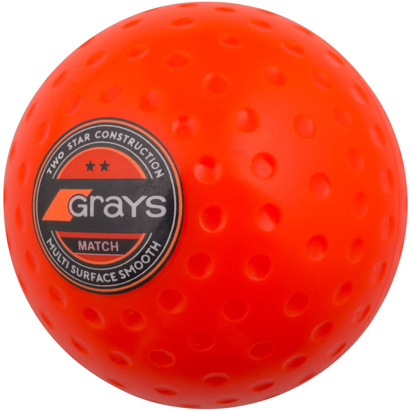 Bright orange Grays Match hockey ball with a textured surface and distinctive logo, designed for multi-surface play, showcasing two-star construction.